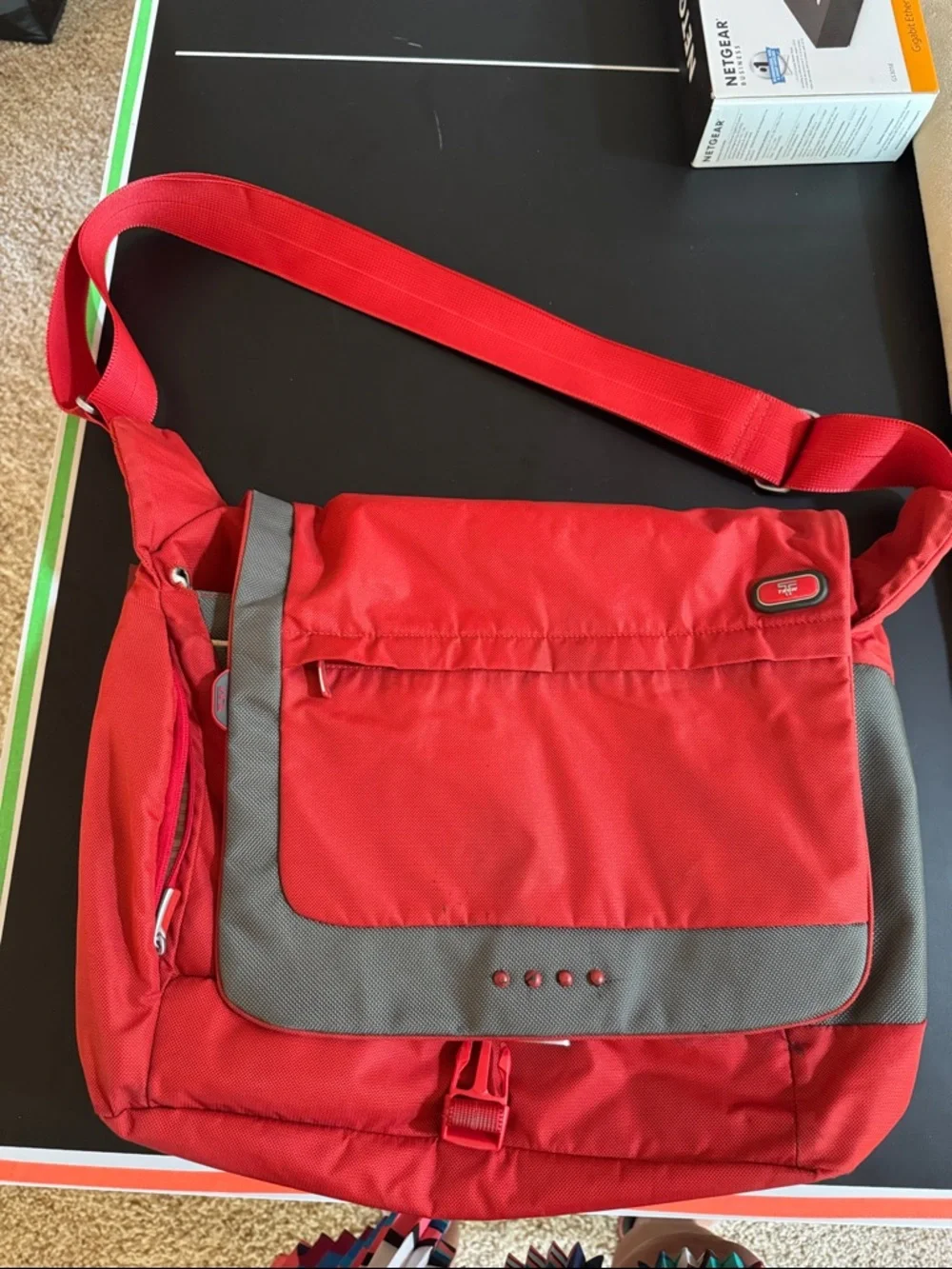 Tumi Red Messenger Bag with Gray Accent. Expandable. Laptop section.